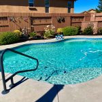 Swimming pool handrail installation