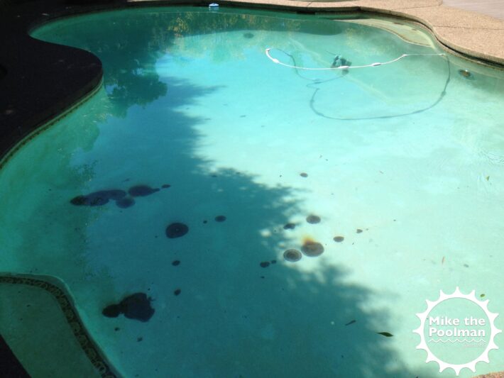 Rebar stains throughout swimming pool